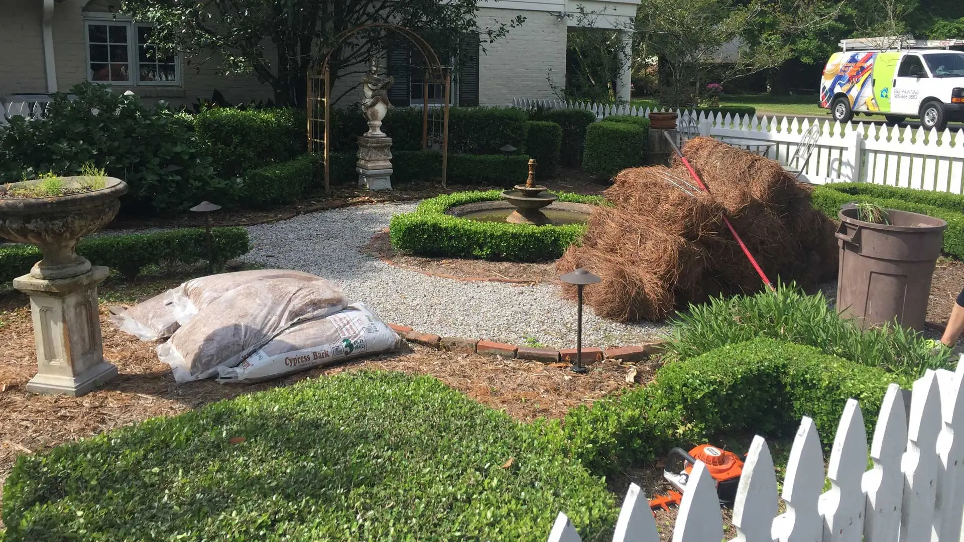 Lafourche Lawn & Farm employees laying new sod and mulch at a home in Thibodaux. Start your new career with our team today!